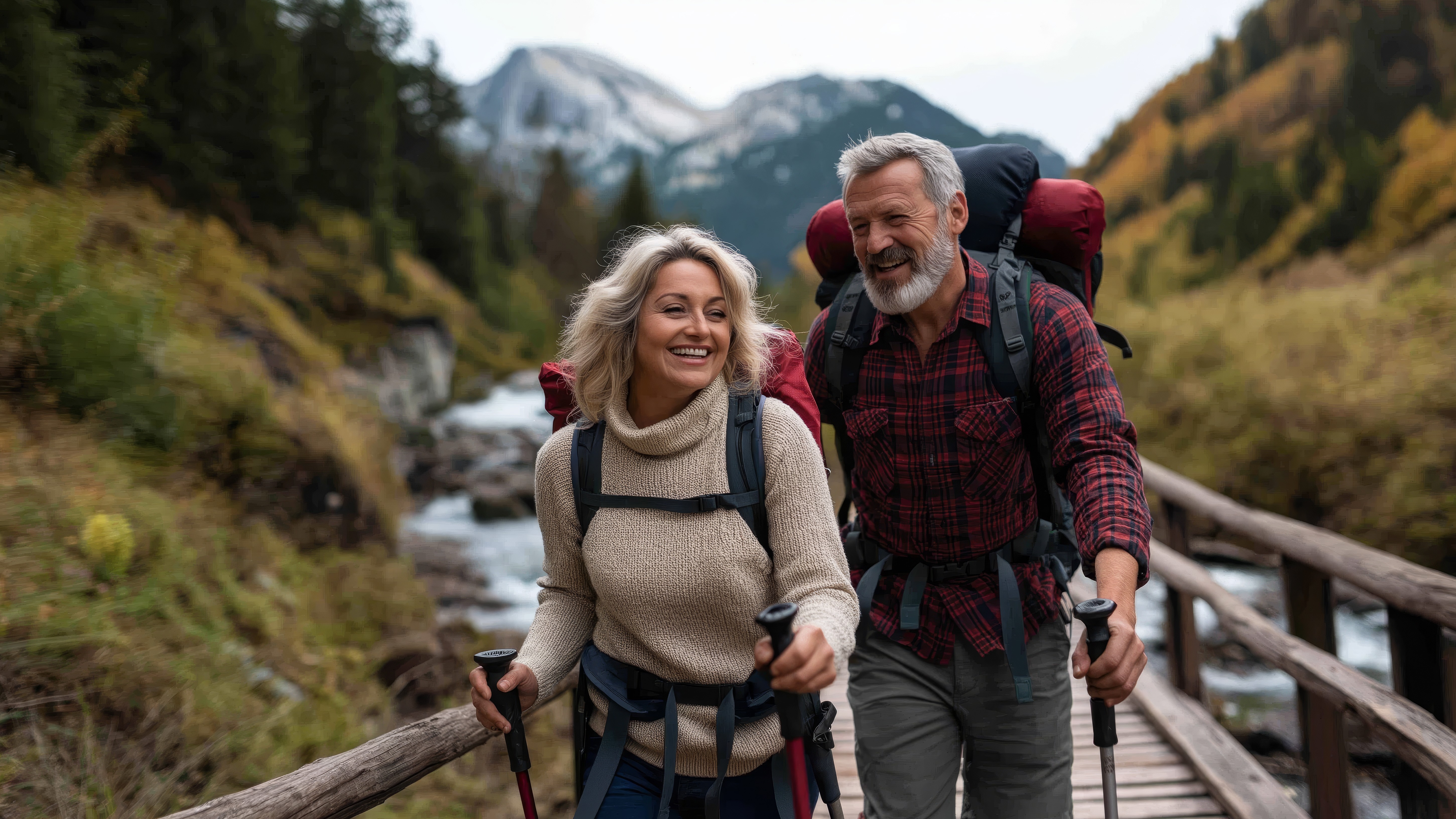 vecteezy_middle-aged-couple-hiking-together-across-a-wooden-bridge-in_71617618111