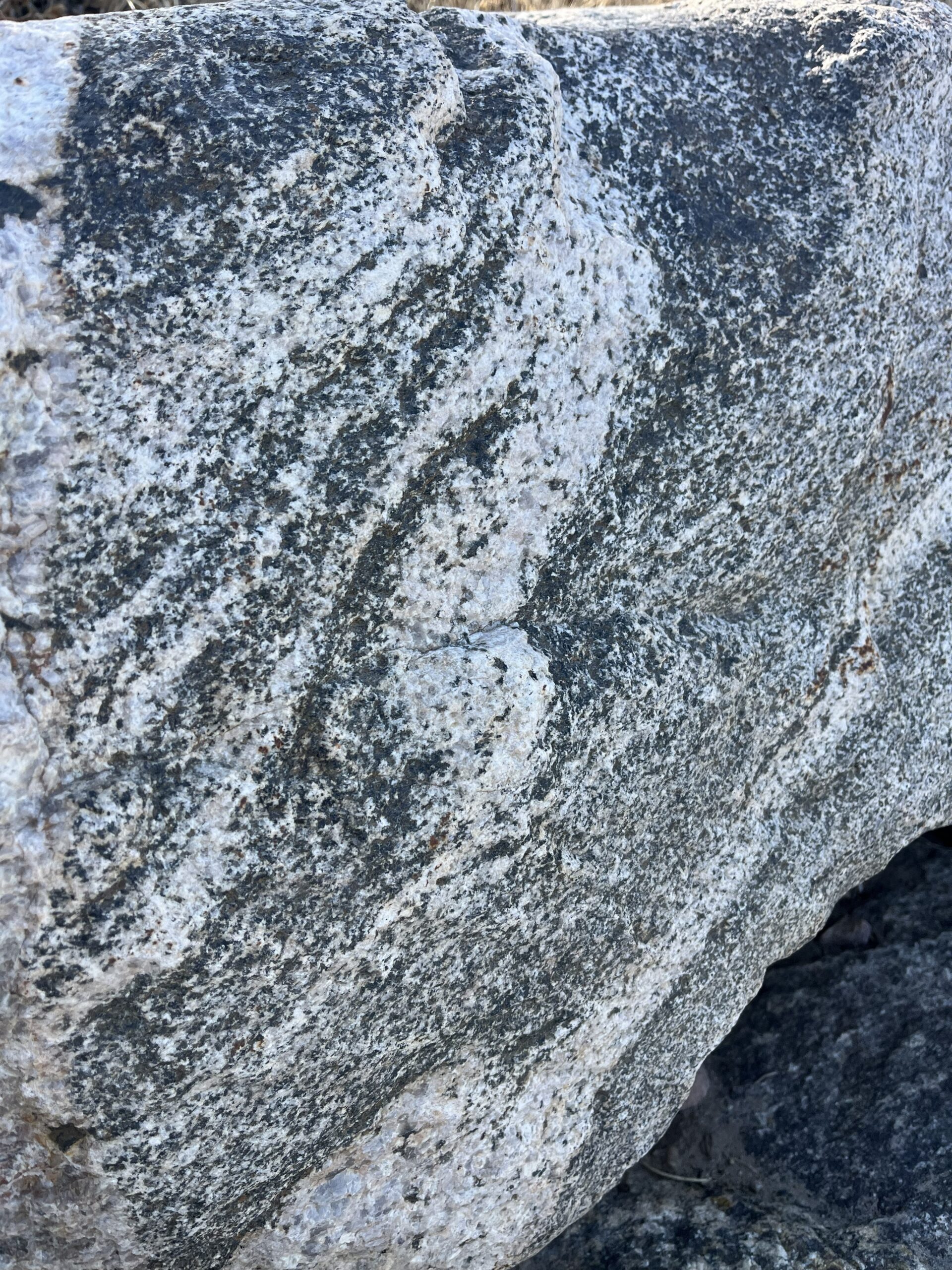 Natural layers and patterns visible within rock